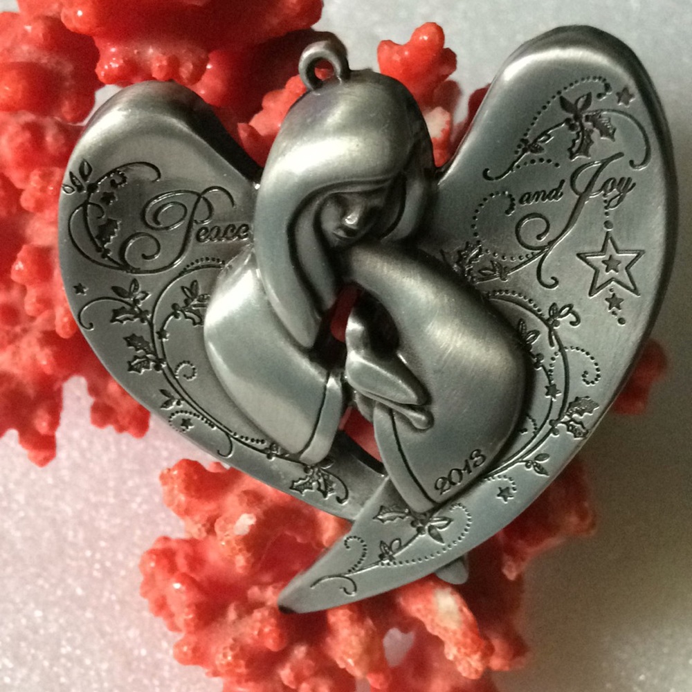 AGC,LLC angle with bird pendent